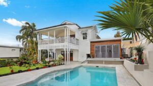 citrus-park-home-shortlist - TheAlexAlvarezRealtor - TheAlexAlvarezRealtor suburban home with a landscaped lawn