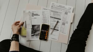 tampa-bay-mortgage-planning - TheAlexAlvarezRealtor - TheAlexAlvarezRealtor calculator and financial documents for mortgage planning